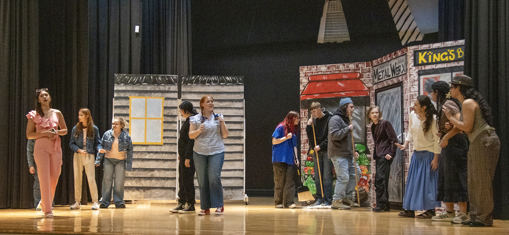 students on stage for a play