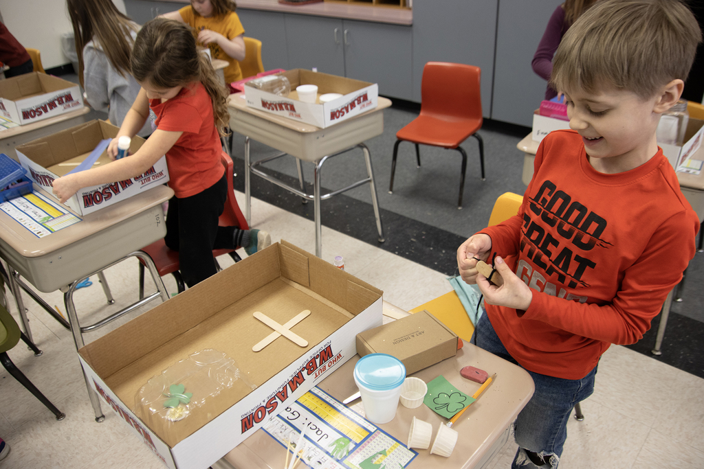 2 students working on leprechaun traps