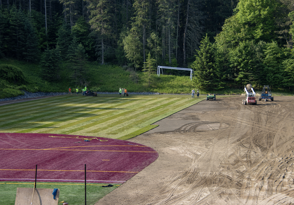 close up view of softball field getting turf installed