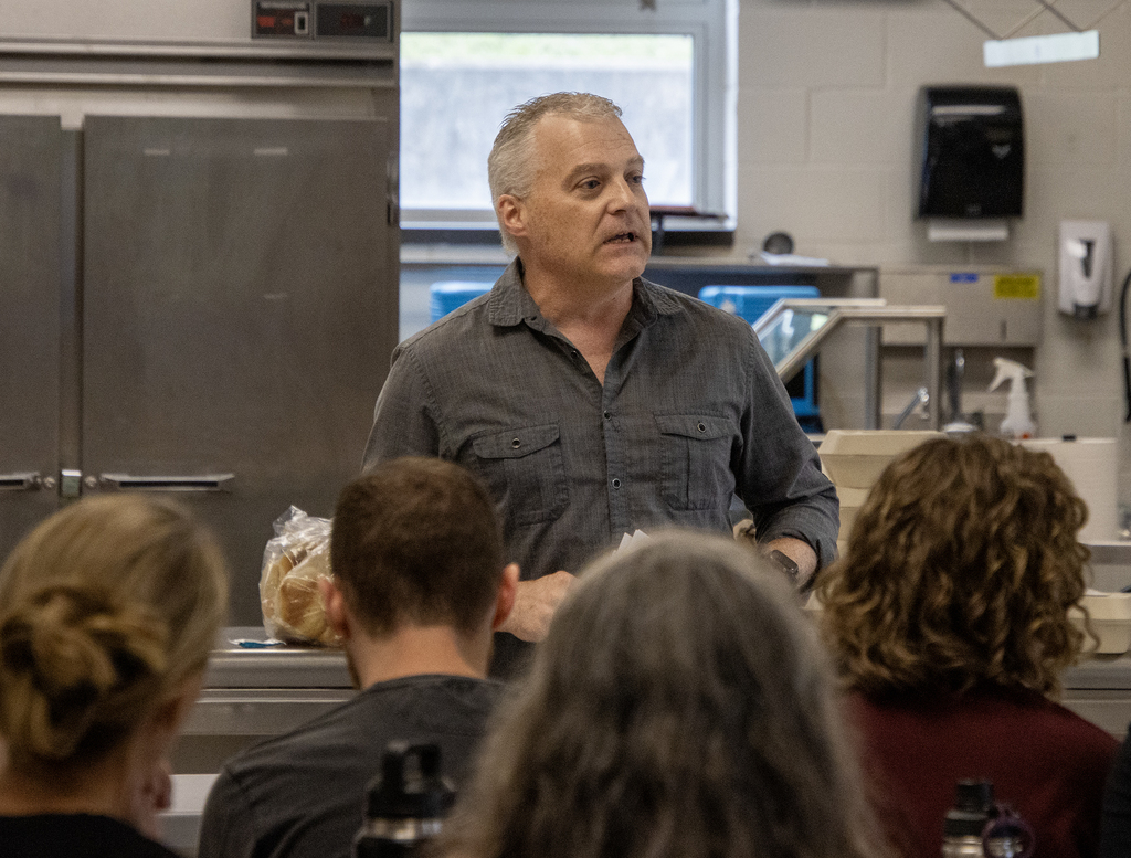 superintendent speaks to crowd