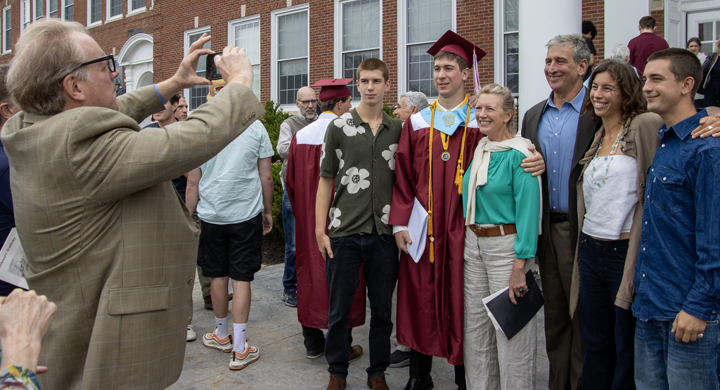 Rocco poses for picture with his family