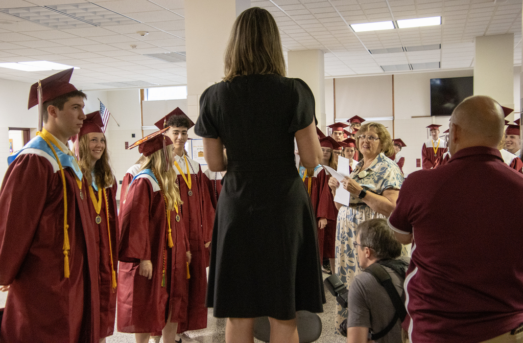 Ms. trask addrsses seniors before processional