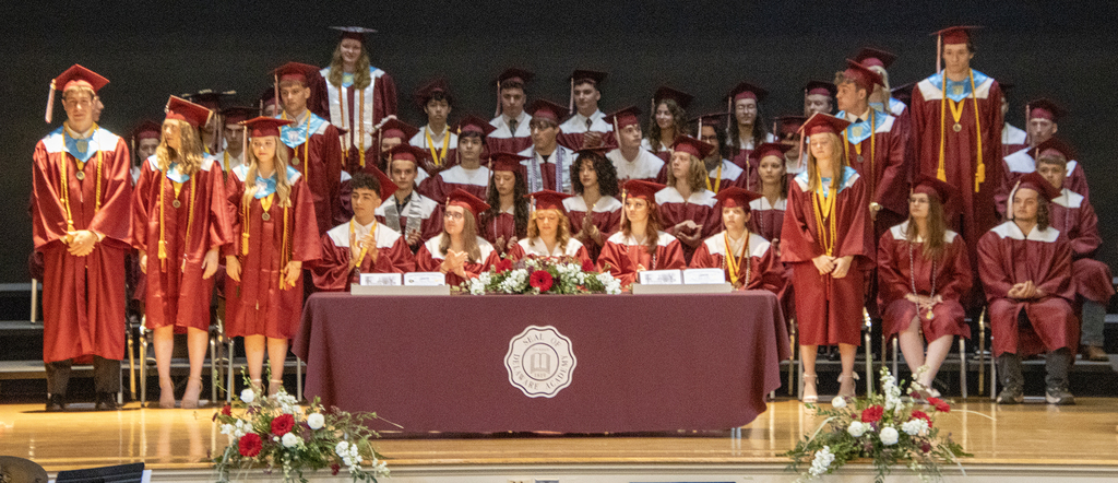 NHS students stand on stage