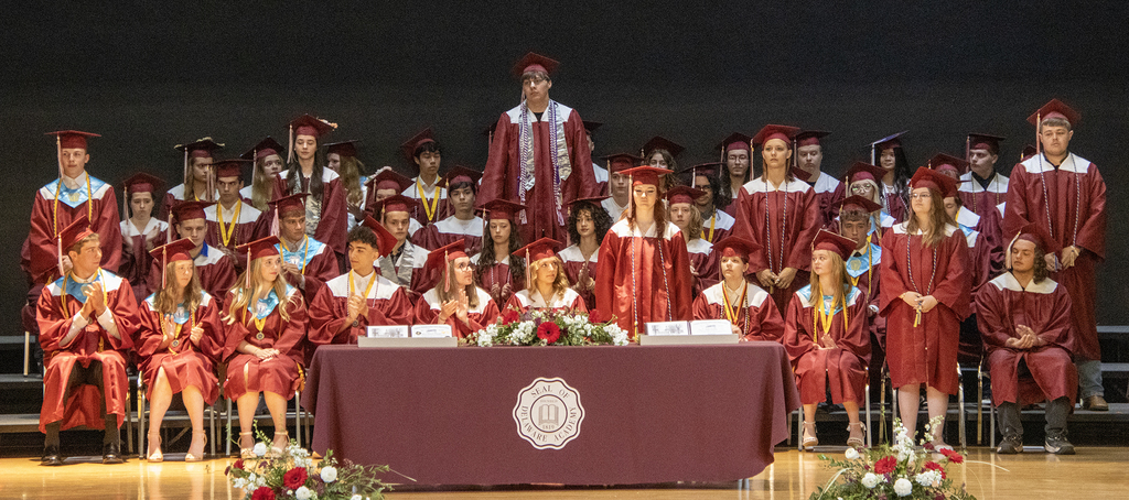 NTHS students stand on stage