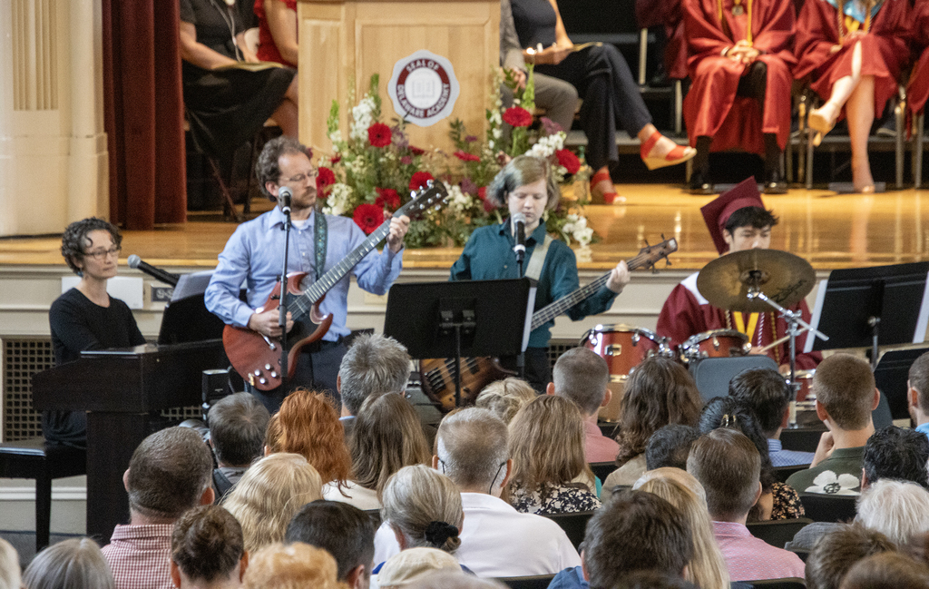 student and teacher ensemble; senior on drums