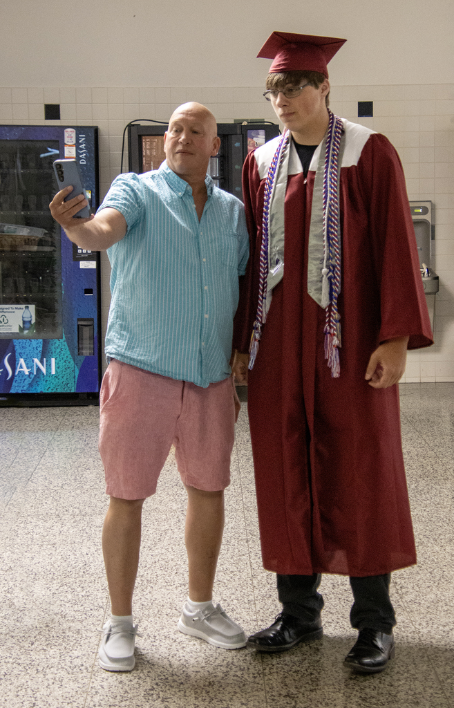 adult and graduate selfie