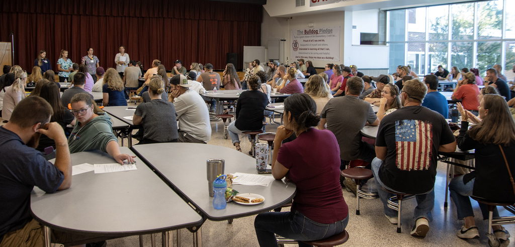health staff speak to the audience
