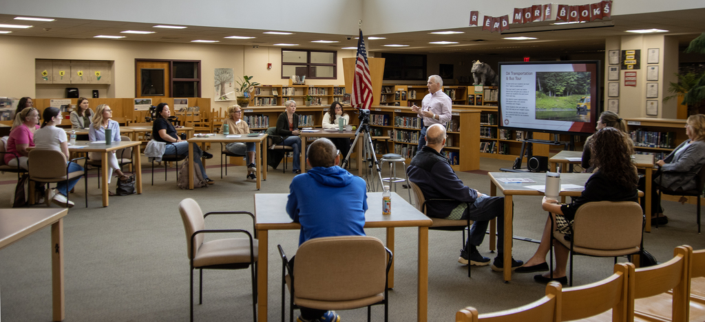 Carey Shultz speaks to new staff