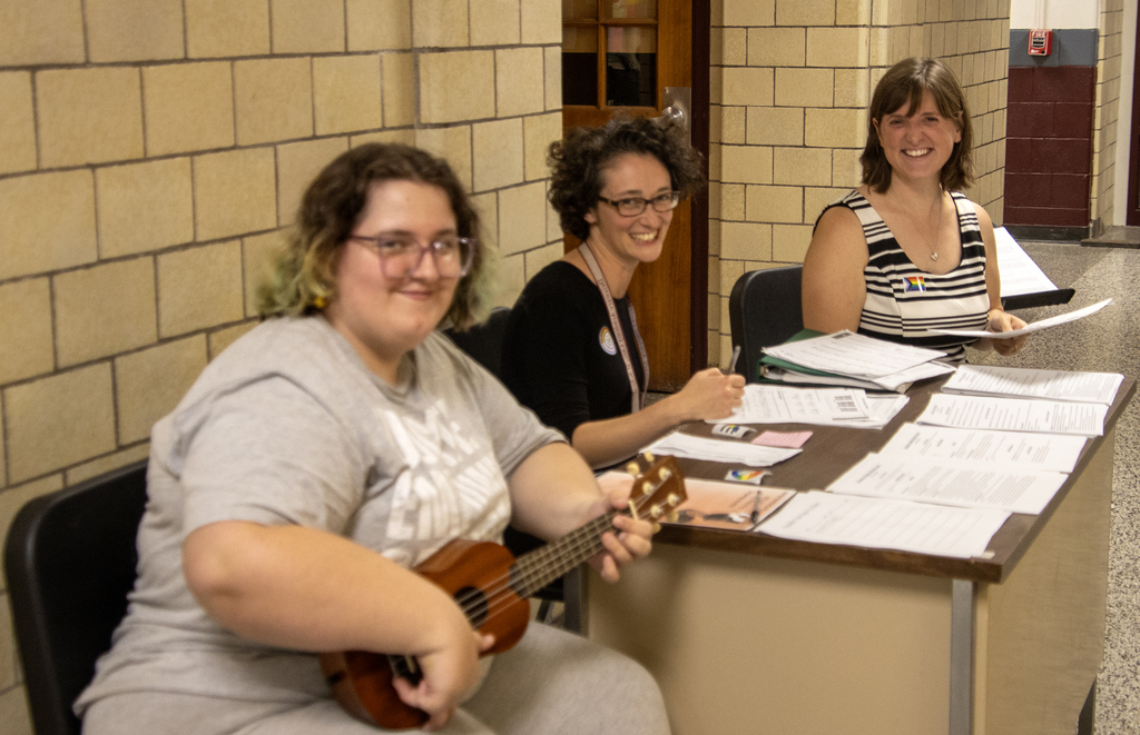 2 music teachers with a student and ukelele