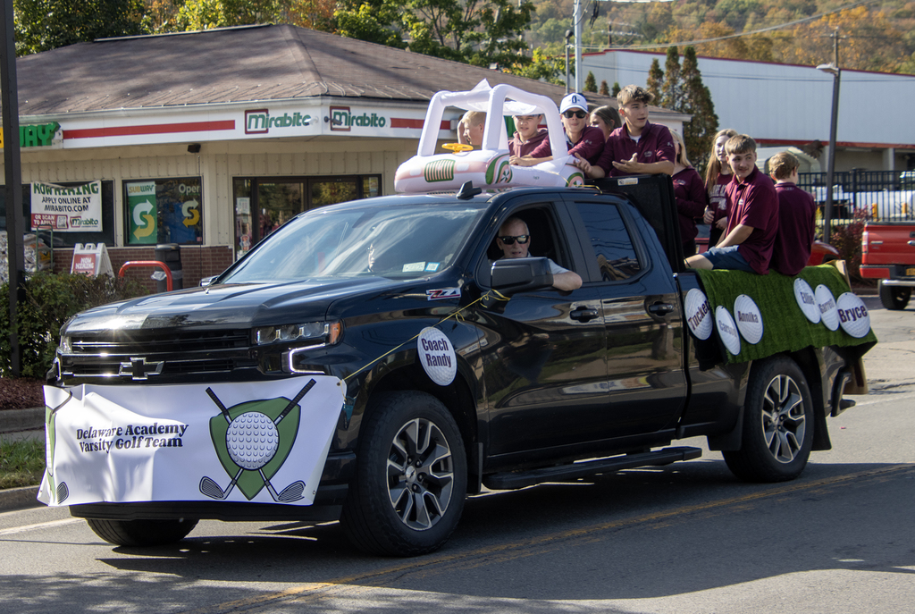 truck with golf team inn parade