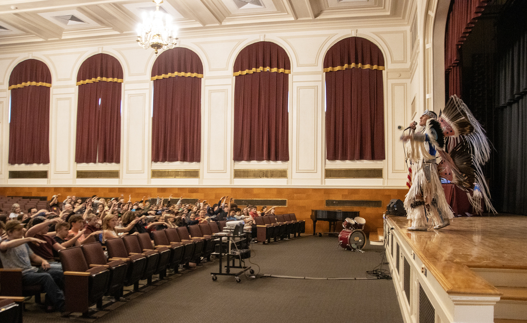 Native American rapper performs for an engaged audience