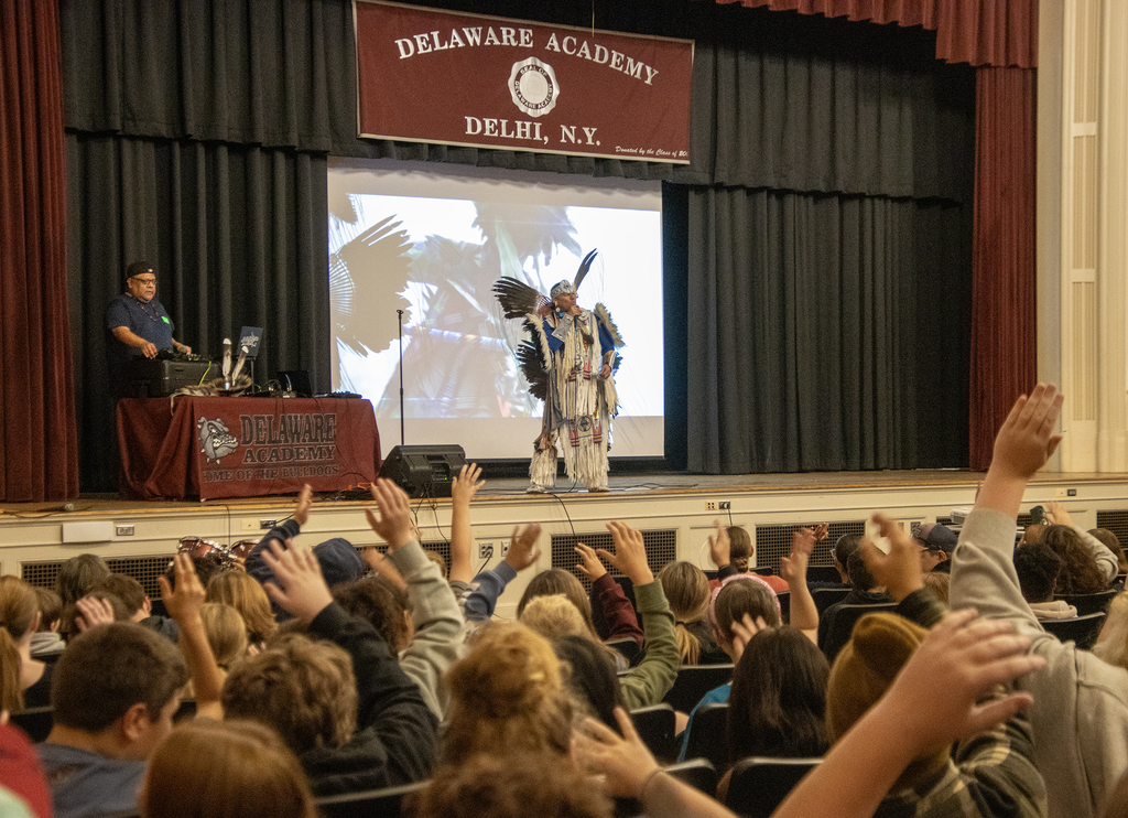Native American rapper performs for an engaged audience
