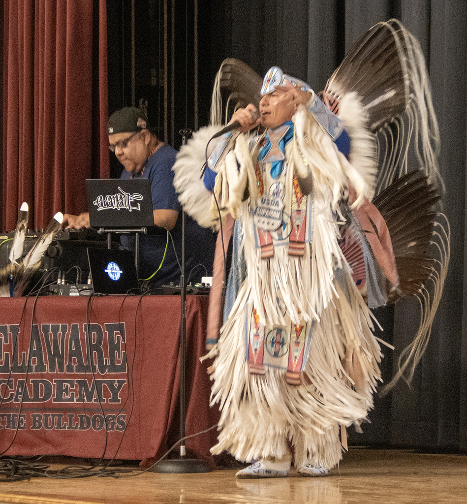 Native American rapper performs for an engaged audience