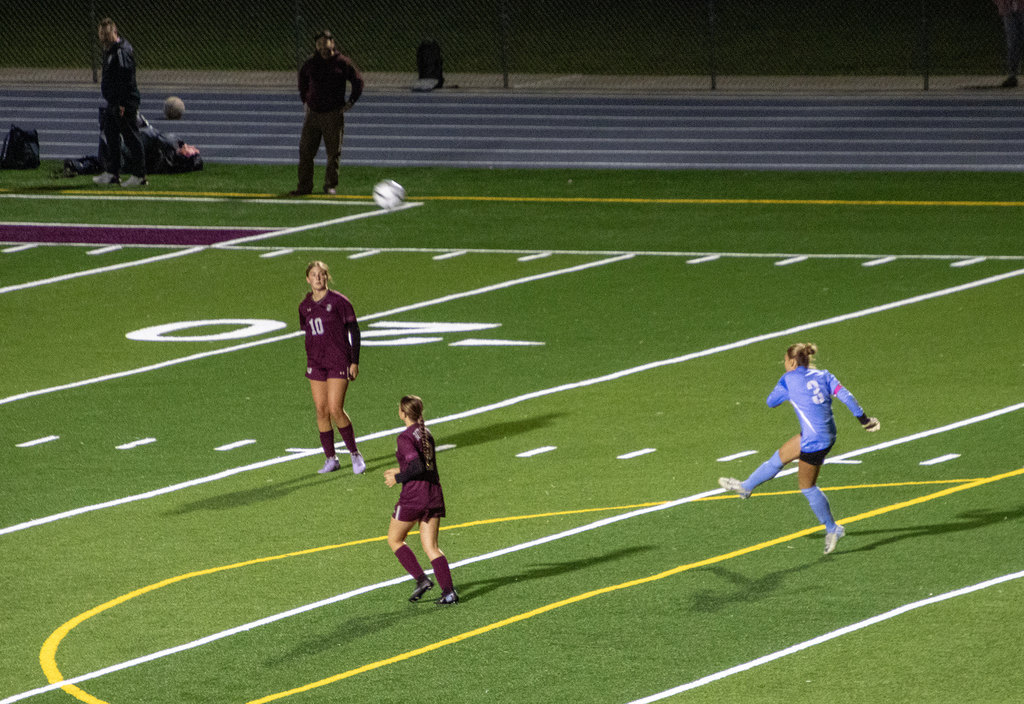 girls varsity soccer in action on the field