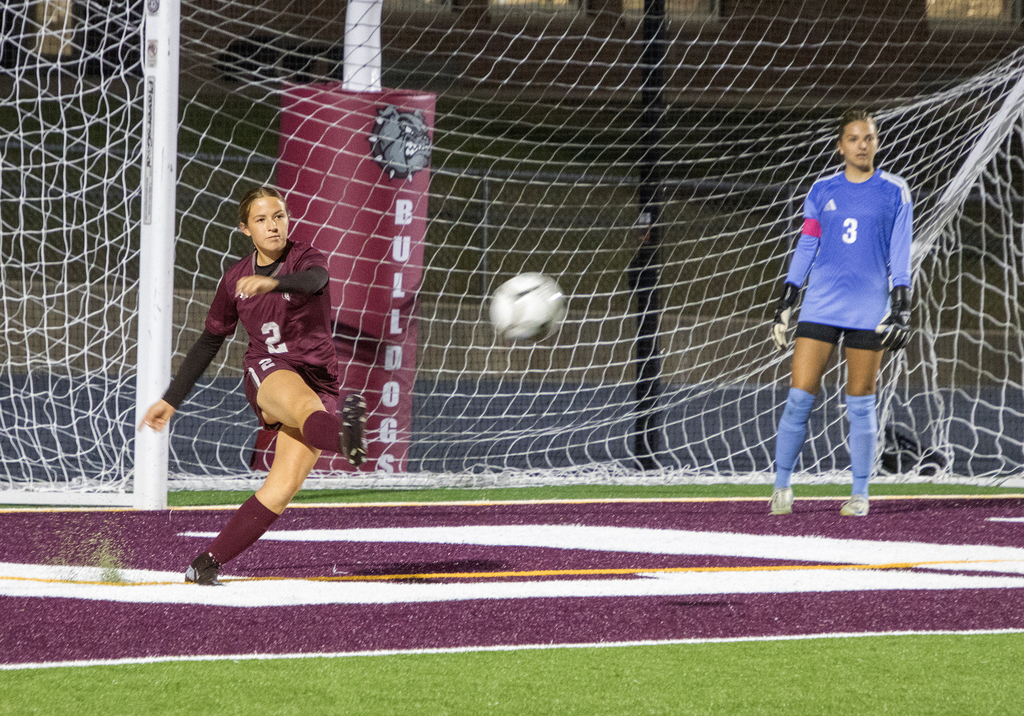 girls varsity soccer in action on the field