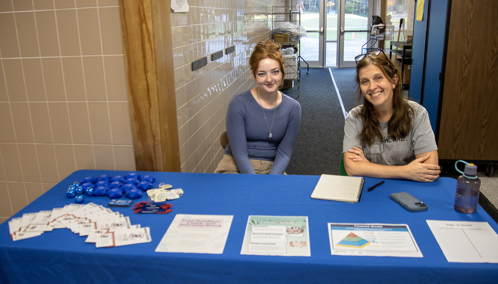 volunteers at a table