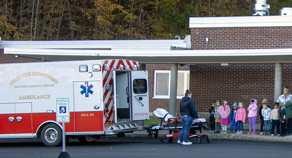 Emergency Squad member explains ambulance to group of students