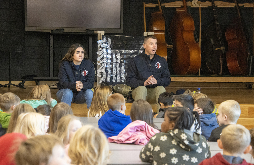 firefighters speak to students and teachers