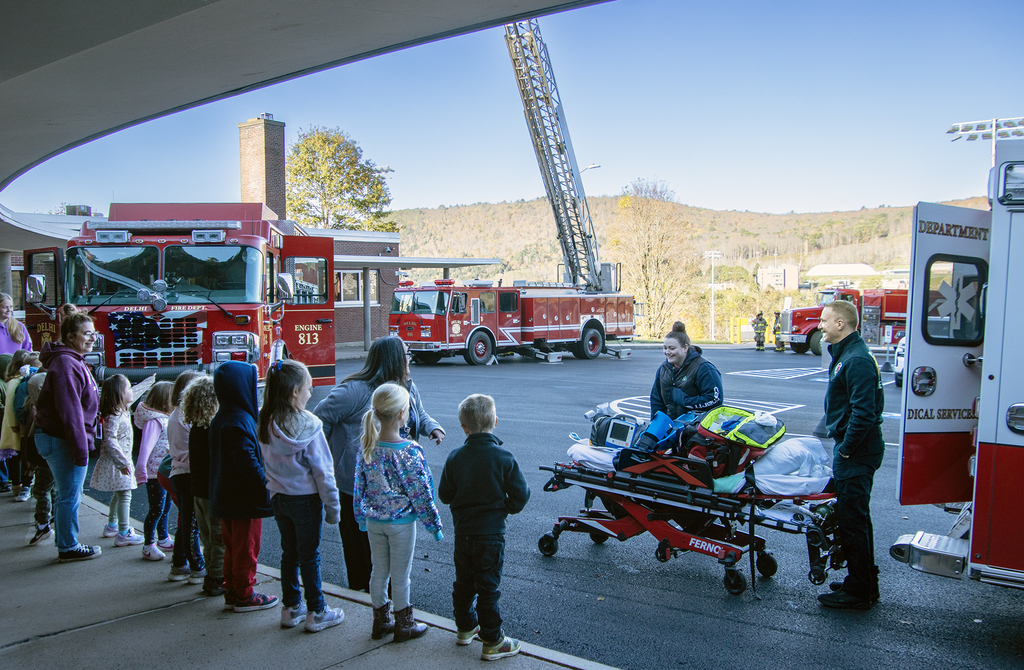 Emergency Squad members explains ambulance to group of students