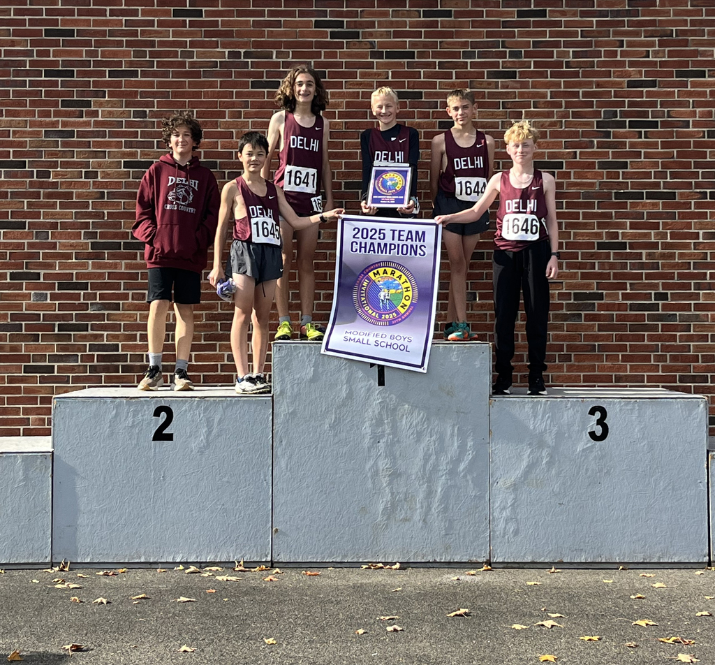 Boys xc team on podium in 1st place
