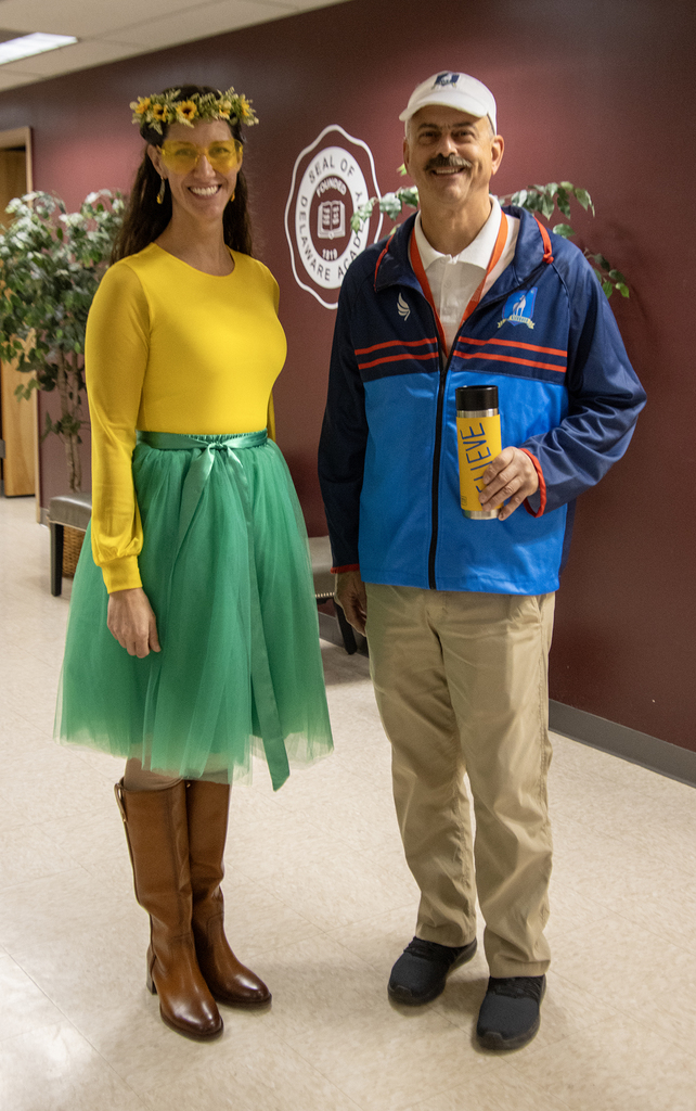 Elementary principals dressed as Summer and Ted Lasso