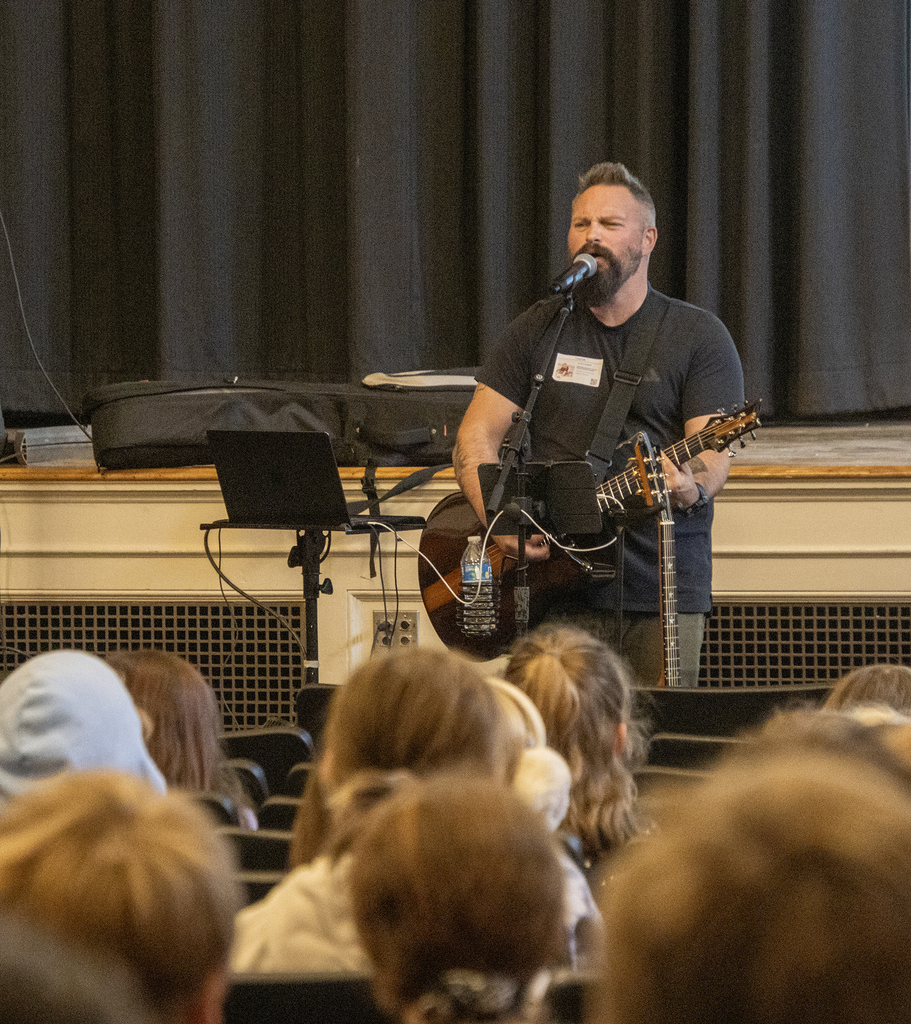 Jared Campbell singing to crowd