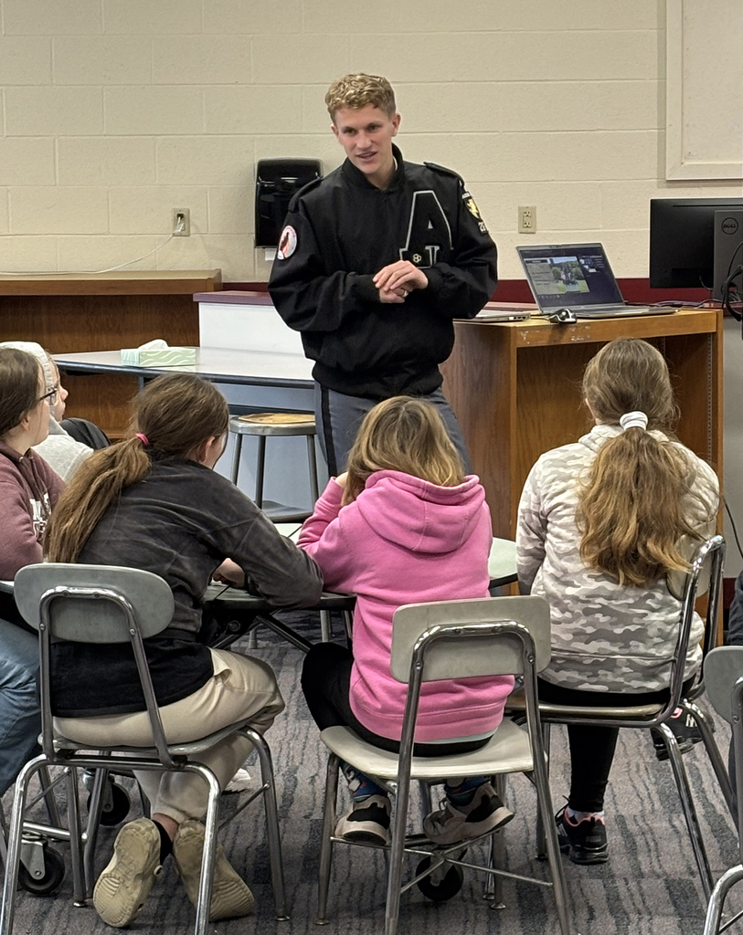 Cadet Gregory speaks with 6th grade students