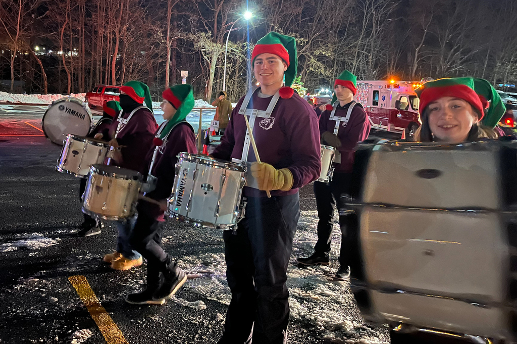 student drummers in elf hats