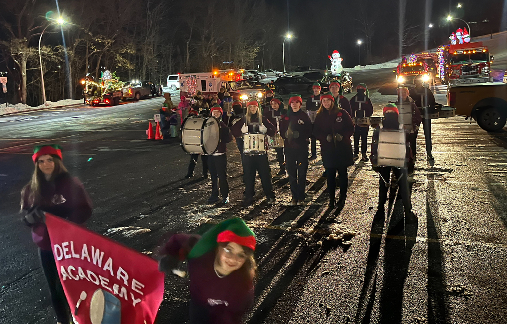 student drummers in elf hats