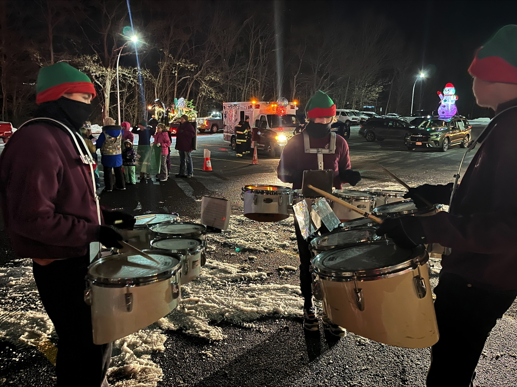student drummers in elf hats