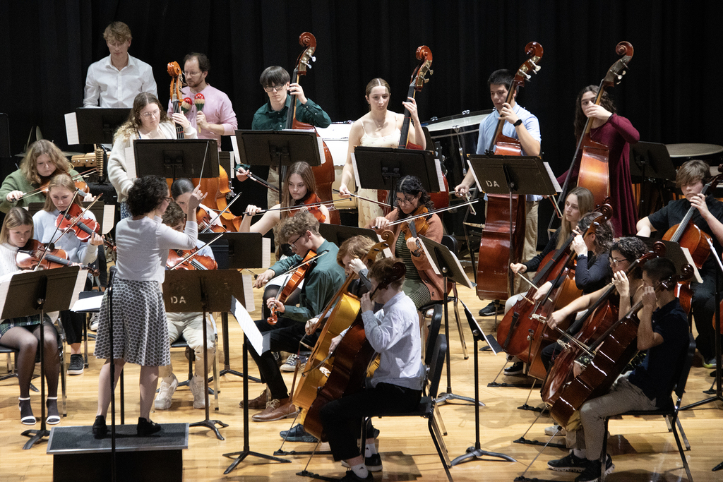conductor leads senior orchestra