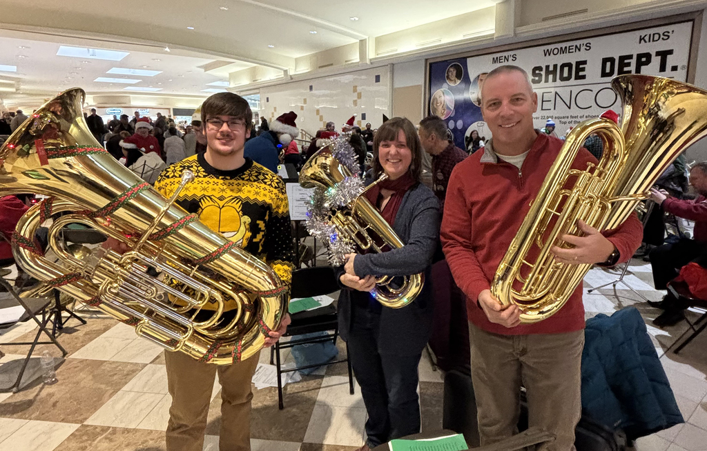 student and two teachers with tubas at tubachristmas 2025