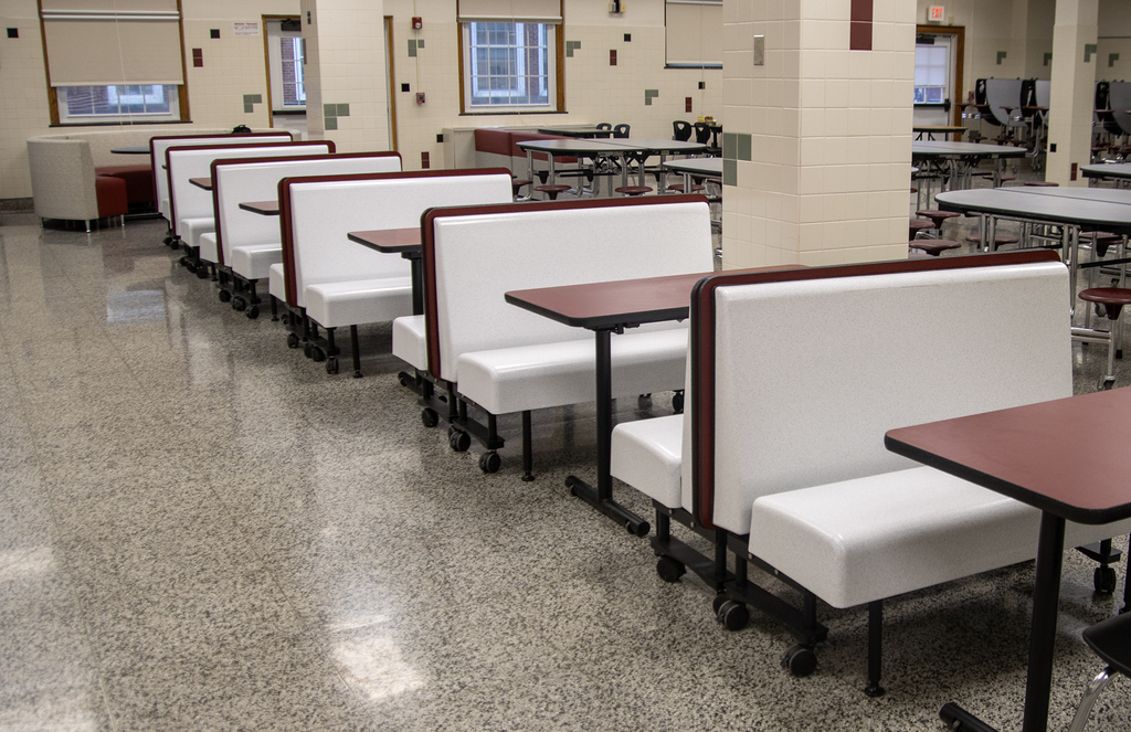 row of dining booths in cafeteria
