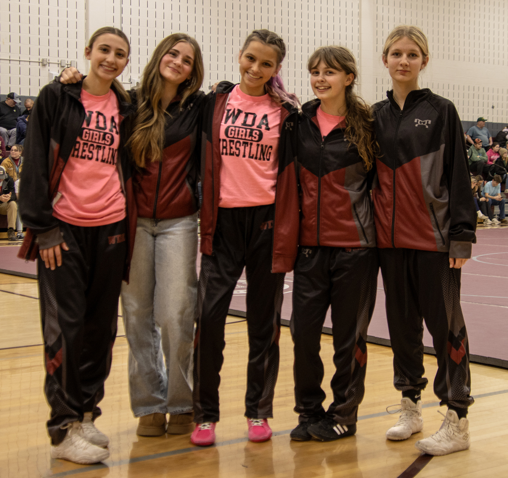 5 girl wrestlers smiling