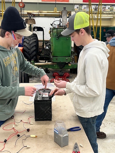 2 students in conservation lab