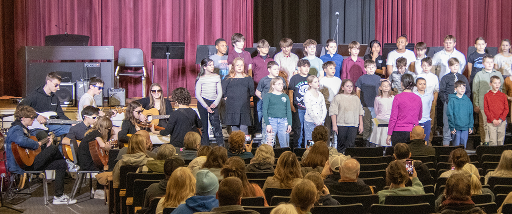 Modern band accompanies the chorus