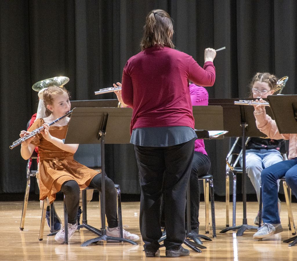 Ms. Lindner conducts two students