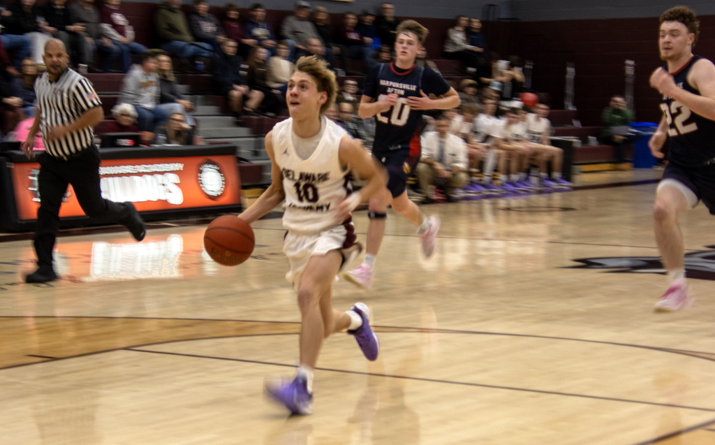 boys basketball action on the court