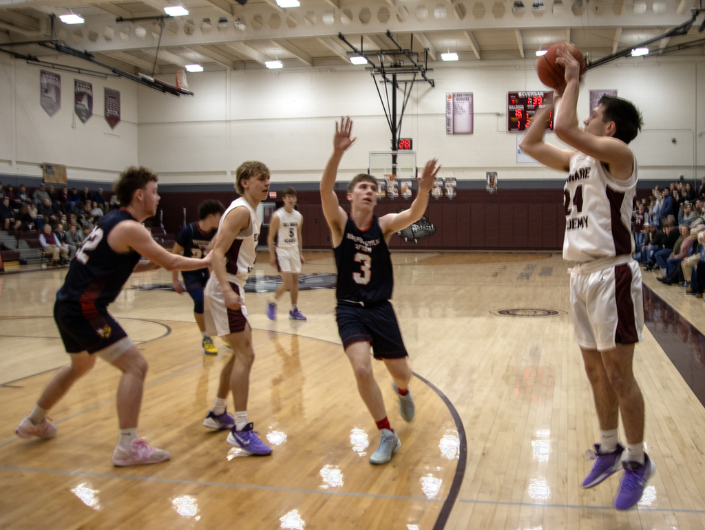 boys basketball action on the court