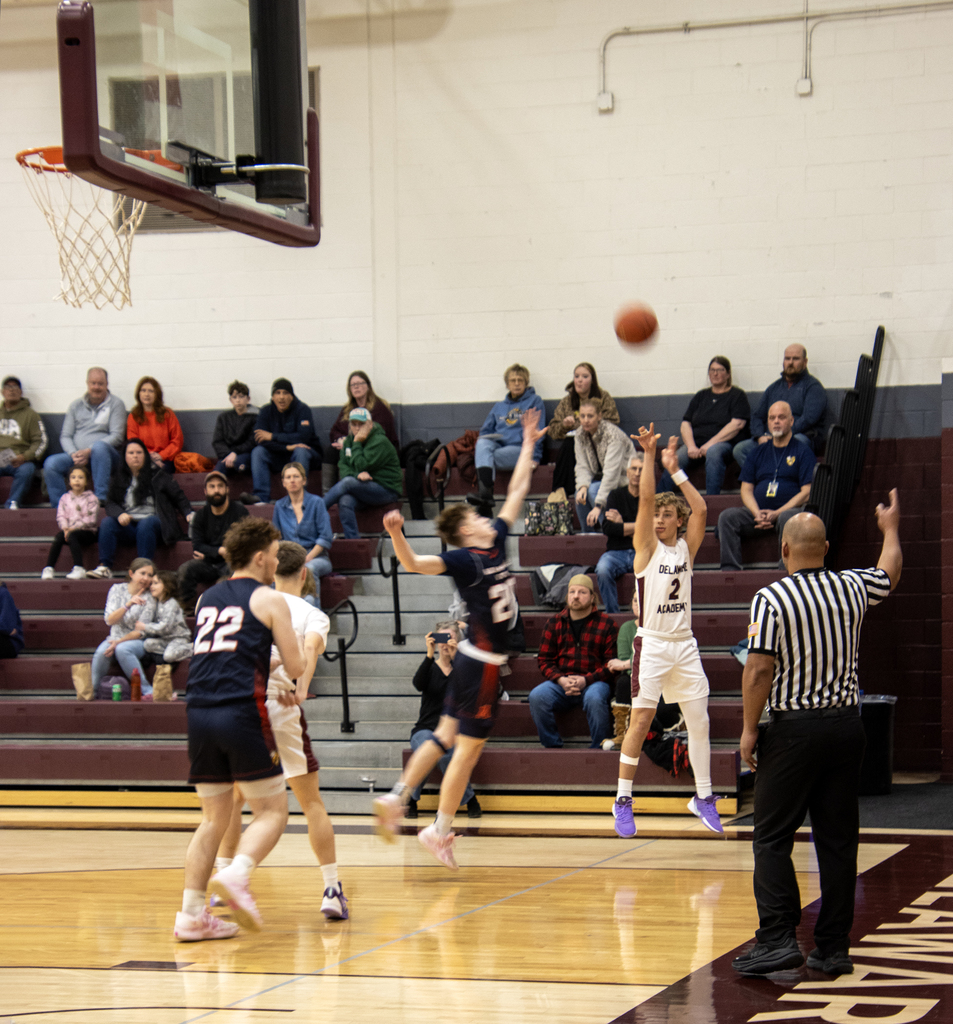 boys basketball action on the court