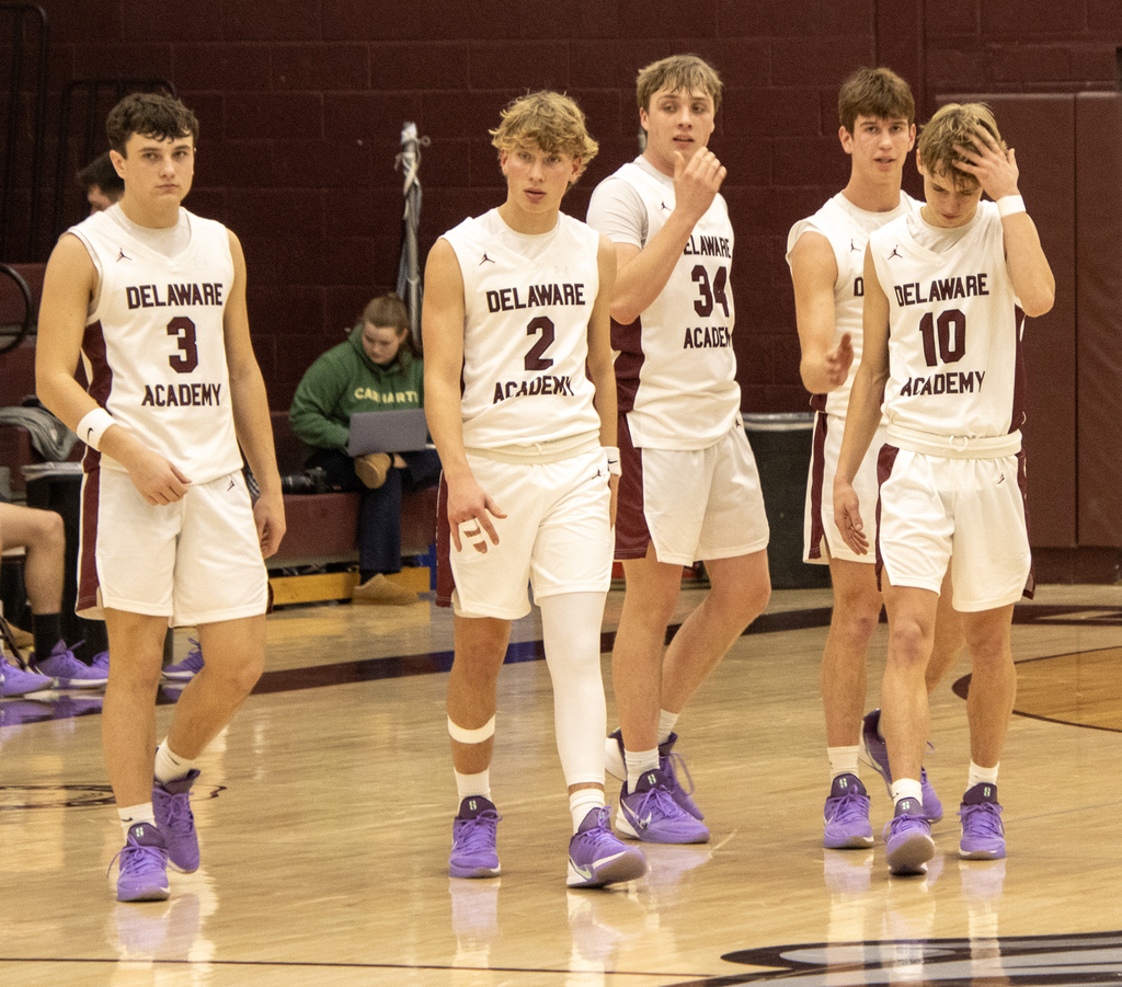 boys basketball action on the court
