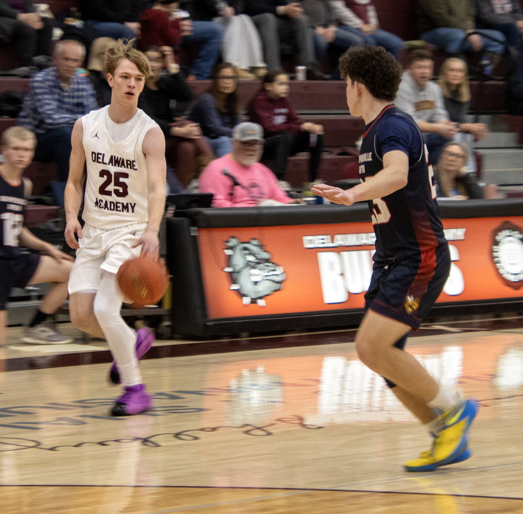 boys basketball action on the court