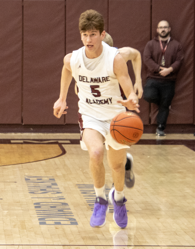 boys basketball action on the court