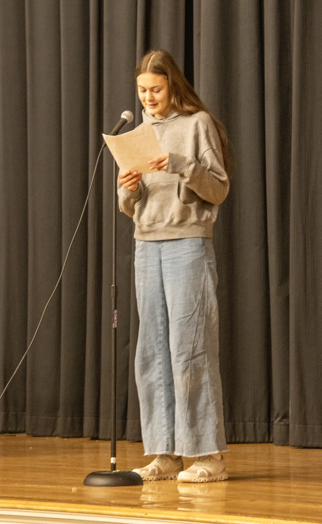 student reads a Robert Frost poem