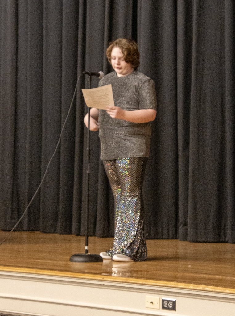 student introduces the next student speaker