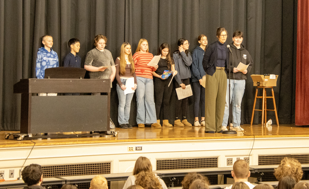 student senate members with Mrs. Grasso on stage