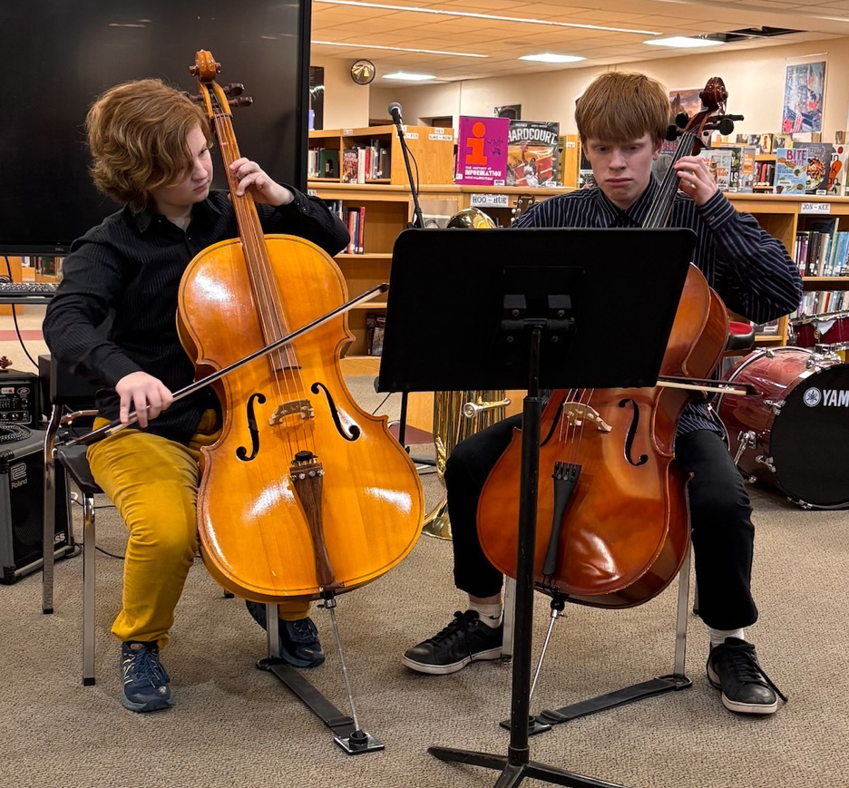 two students in a string ensemble