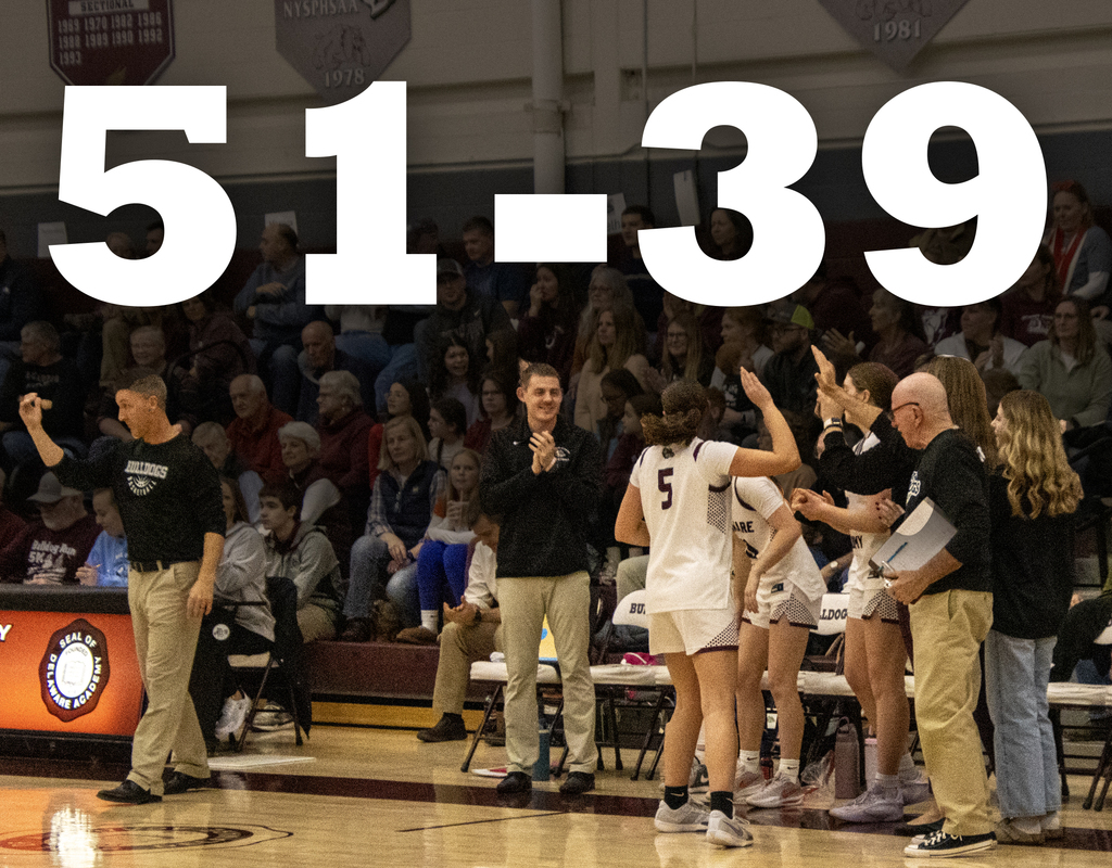 51-39 (girls team, celebrating)