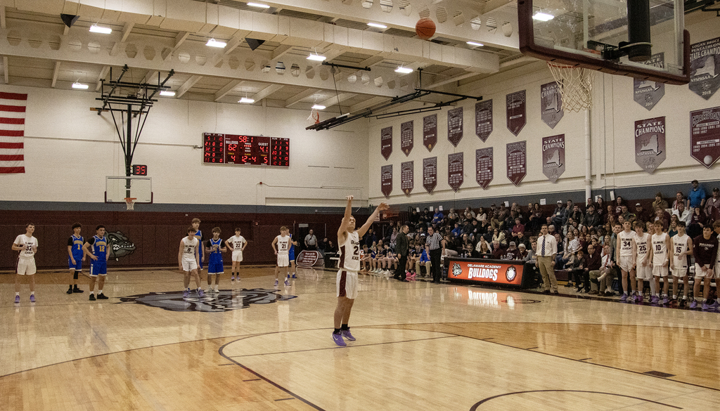 boy shooting technical foul shot in game
