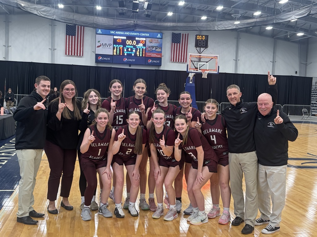DA girls basketball team, coaches and trophy